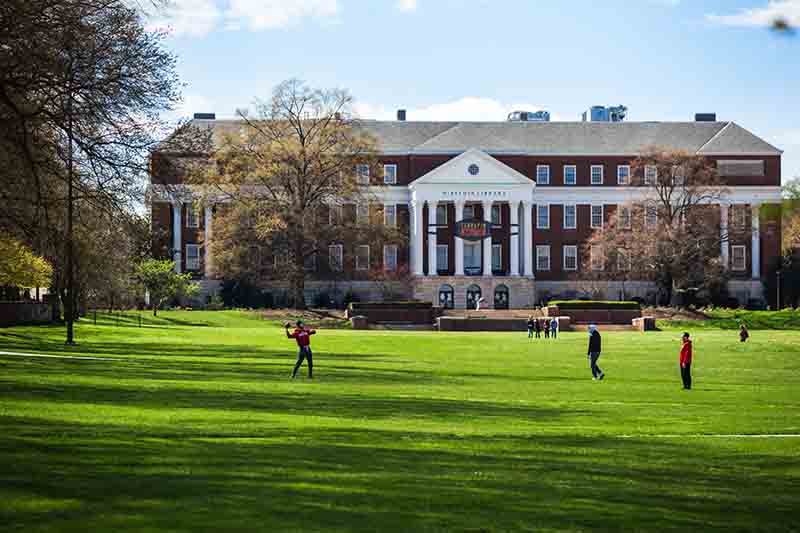 ​​​​Fresh spring grass blankets McKeldin Mall, a green magnet for students looking to spread out for a game of catch. 