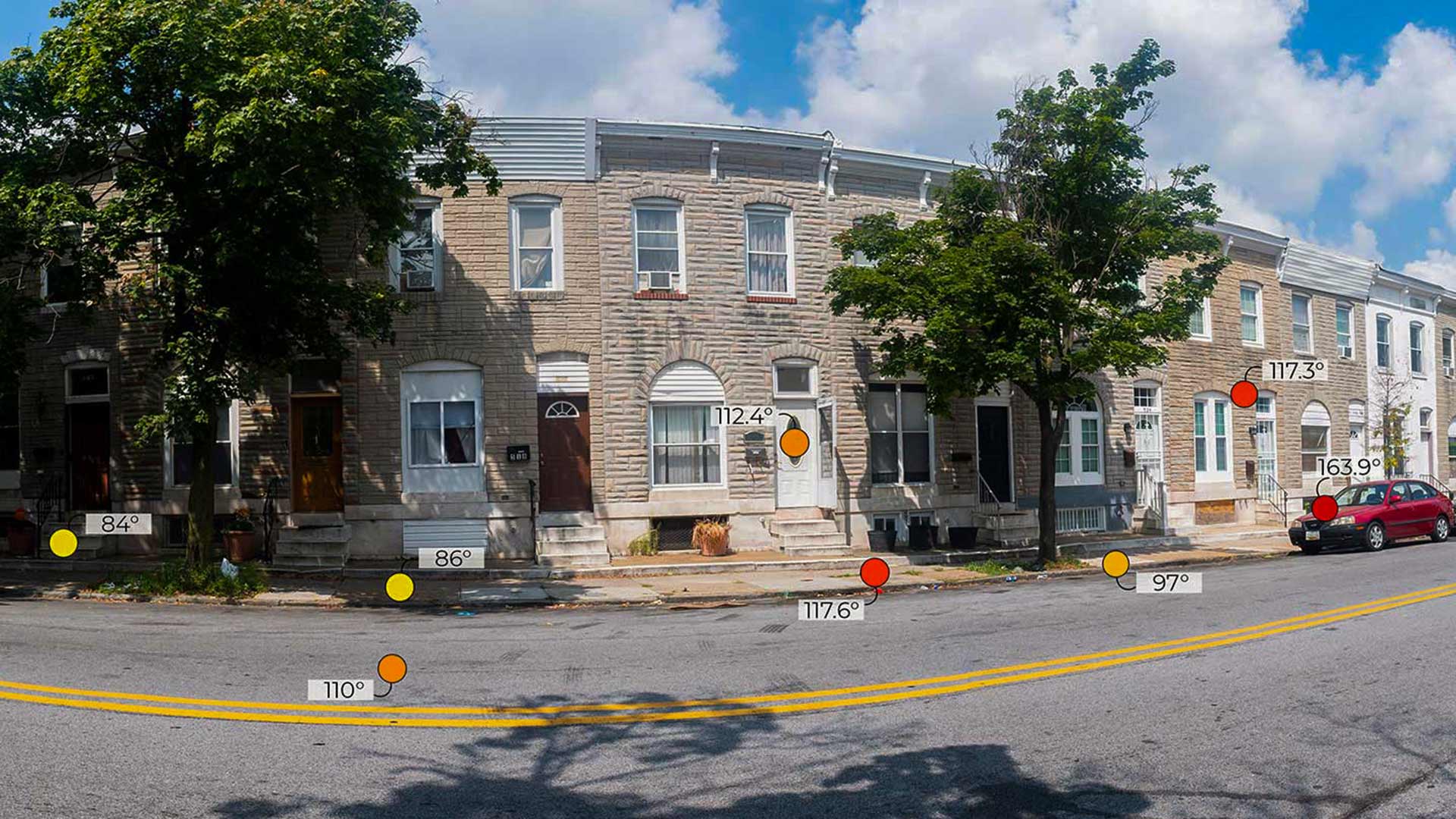 Infographic shows street in Baltimore with different temperatures in sun and shade: 84, 110, 86, 112.4, 117.6, 97, 117.3, 163.9 degrees