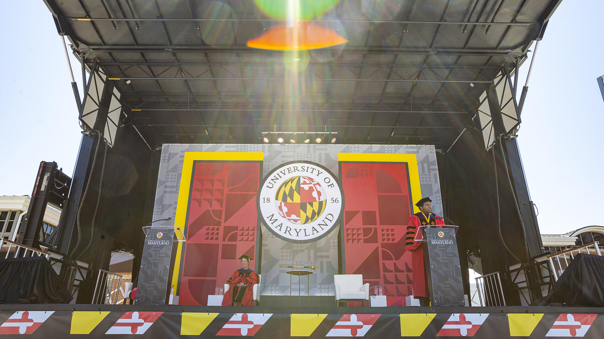President Pines speaks at the podium