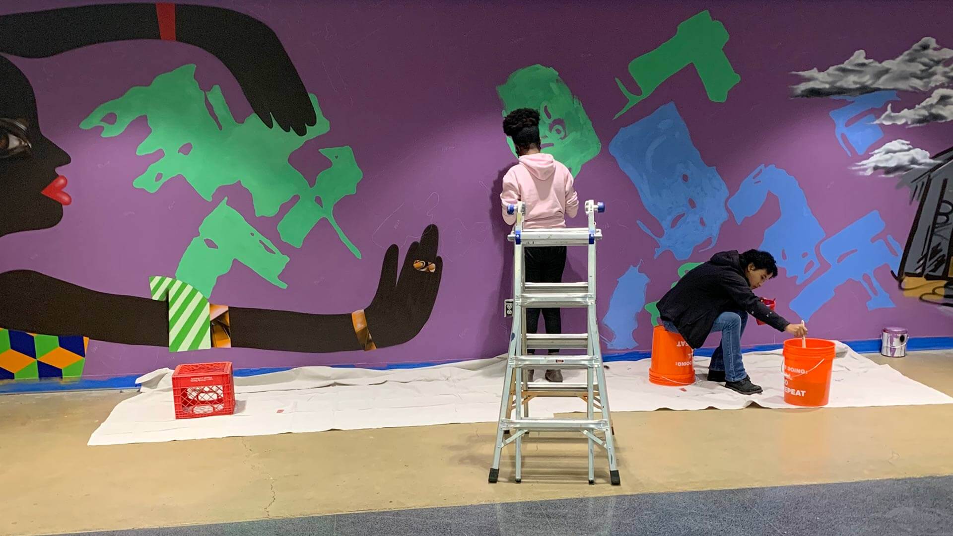 Students working on Driskell Mural