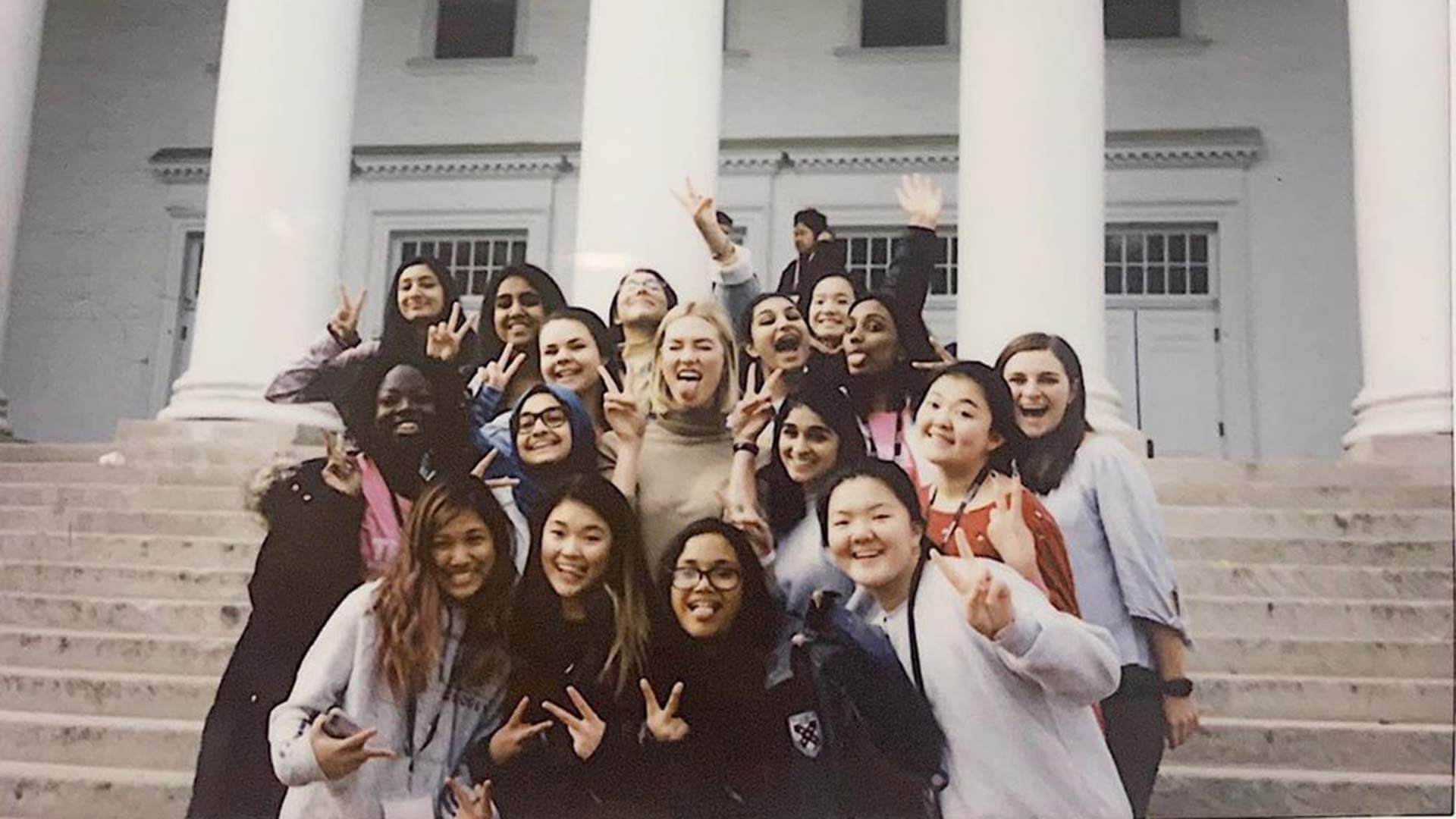 Karlie Kloss makes silly faces with participants of Technica