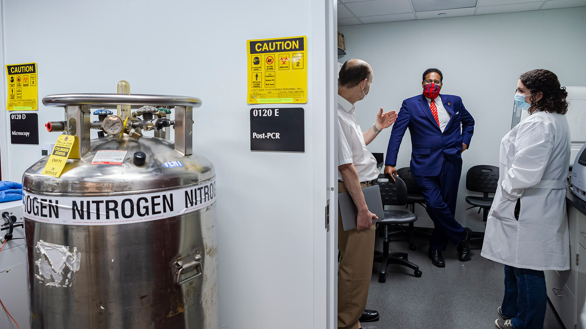 Don MIlton, Darryll Pines and Jennifer German in a lab