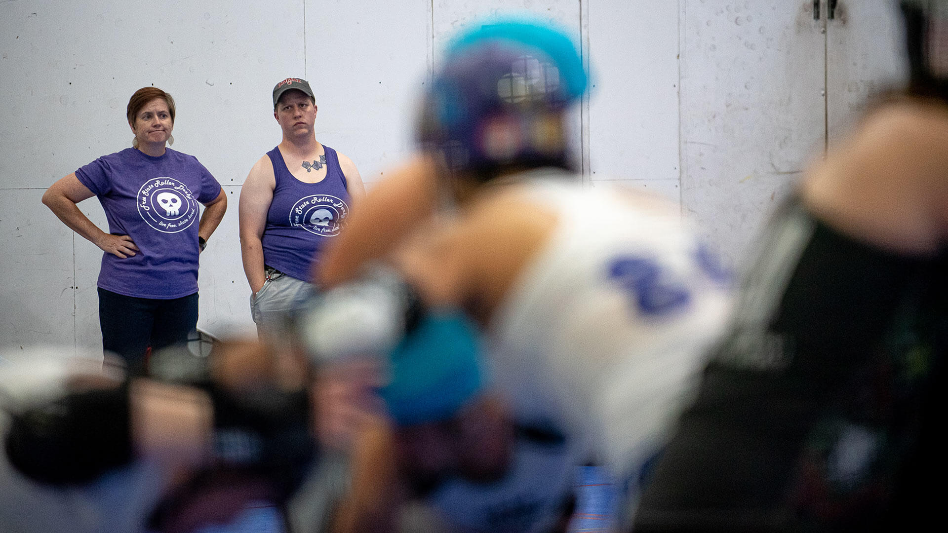 Rainbow Contusion (second from left), sidelined with an injury, surveys a scrimmage at Michael & Son Sportsplex at Rockville on Friday, September 20, 2019.