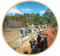 Students Digging in Pit
