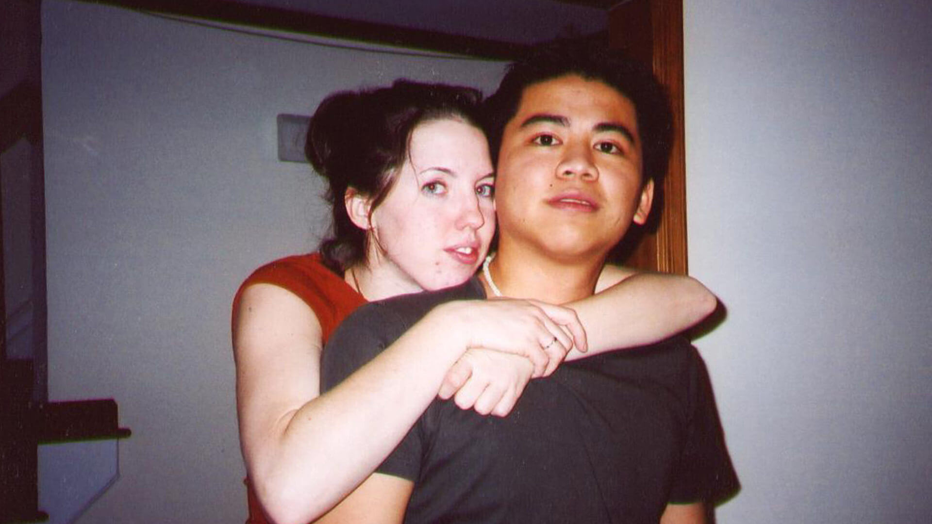Jennifer and Ting Yang with arms around each other 